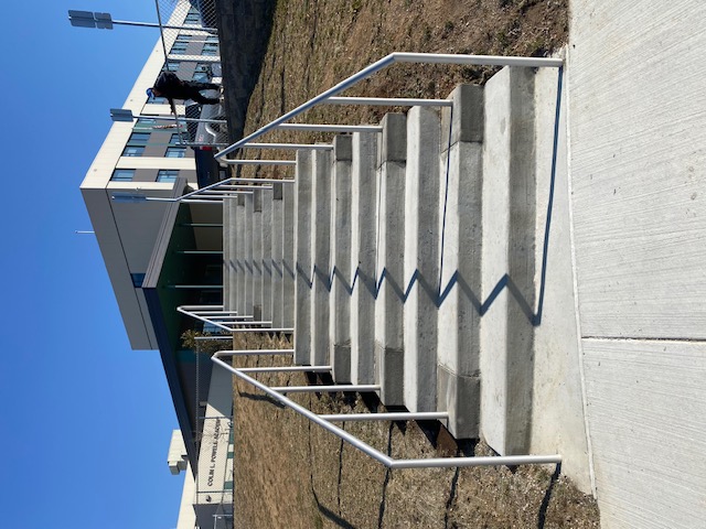 Repaired damaged concrete stairs at Colin Powell